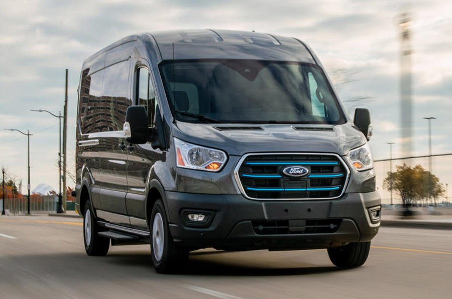 A ford electric campervan driving on a road