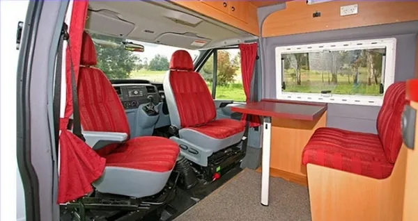 campervan swivel seats in red to create a better campervan interior